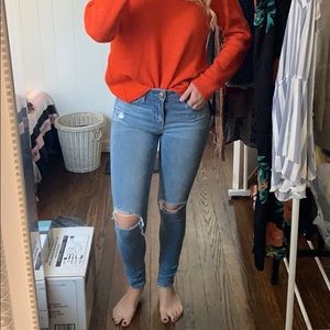 AMERICAN EAGLE RIPPED MID RISE SKINNY JEGGINGS